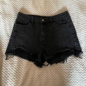 Black distressed shorts